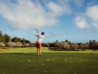 Golf and Spa Holiday – Golf Course Experience Man playing golf on a course at a luxury golf and spa holiday retreat