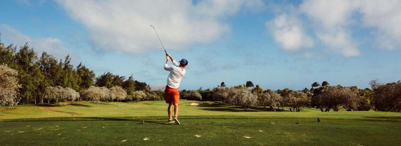 Golf and Spa Holiday – Golf Course Experience Man playing golf on a course at a luxury golf and spa holiday retreat