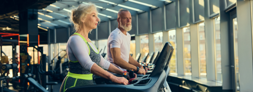 Bespoke Fitness Holiday – Personal Training in gym Woman exercising with a male personal trainer during a gym fitness session on a bespoke fitness holiday