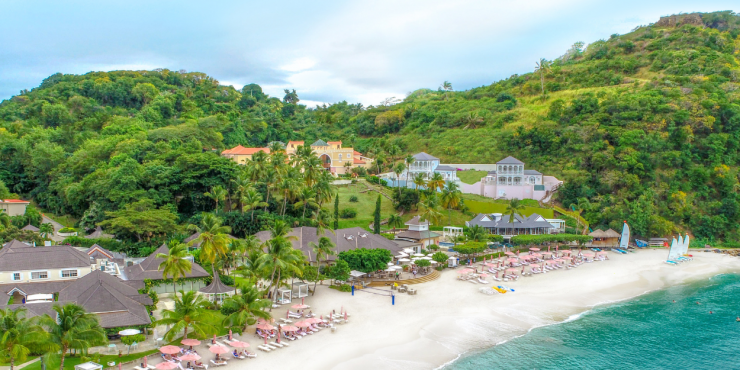 Body Holiday Resort on the beach in Saint Lucia, Caribbean Beachfront view of Body Holiday resort in Saint Lucia, Caribbean, with golden sand and turquoise sea