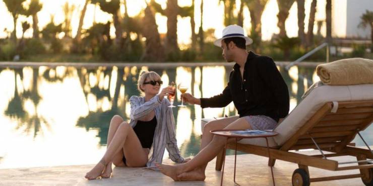 The View Agadir Couple sharing a drink by the pool at The View Agadir